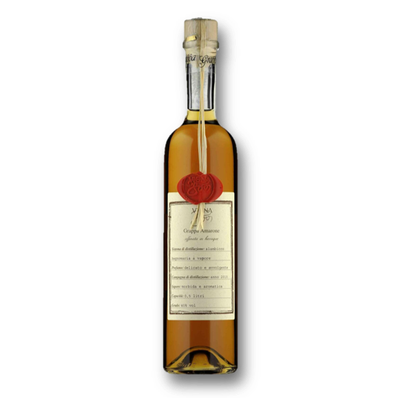 Grappa Riserva Ambrata in an elegant bottle with a classic label, showcasing its premium Italian heritage.